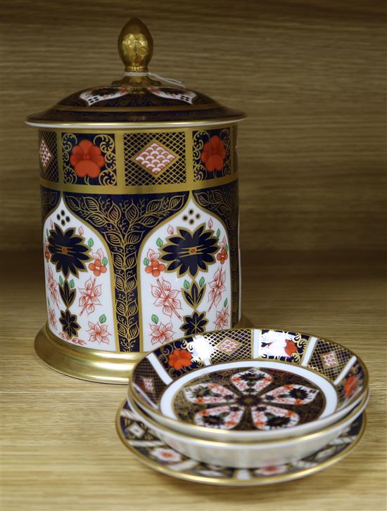 A Royal Crown Derby old Imari pattern biscuit jar and cover and three dishes